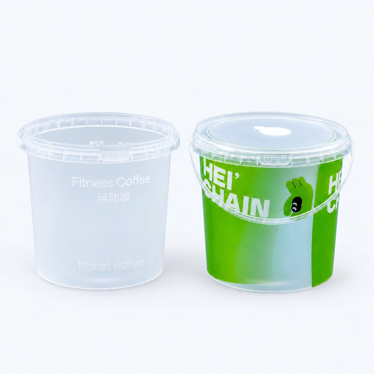 Clear and decorated round pails with matching plastic lids and carry handles